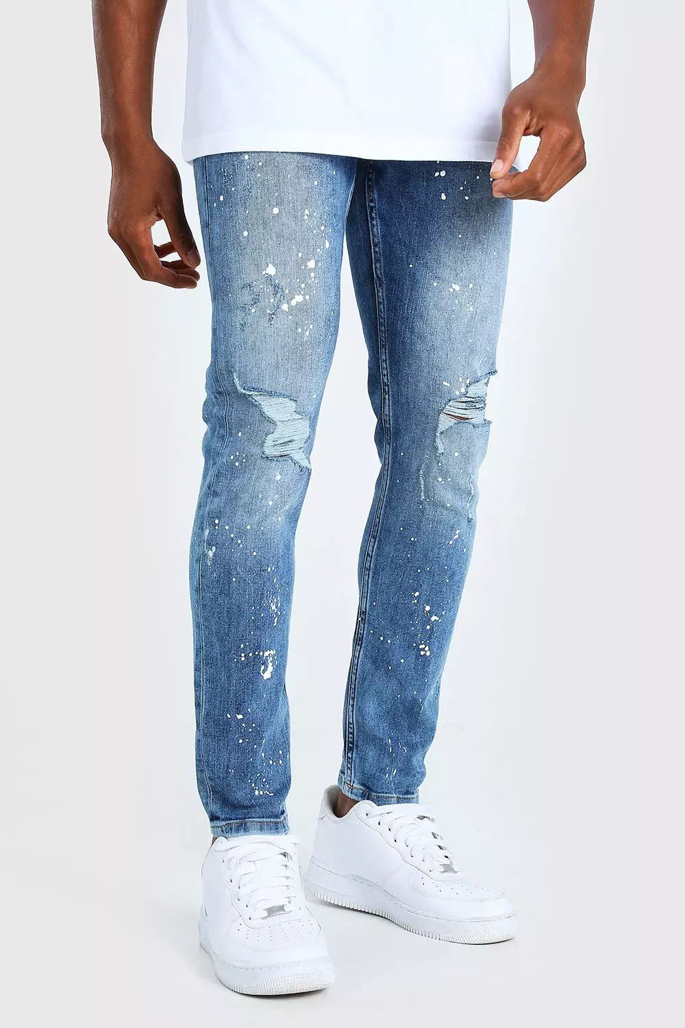 Spray on best sale skinny ripped jeans